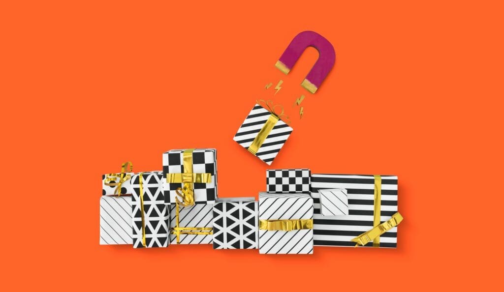 Aimant violet attirant des cadeaux de Noël à motifs noirs et blancs